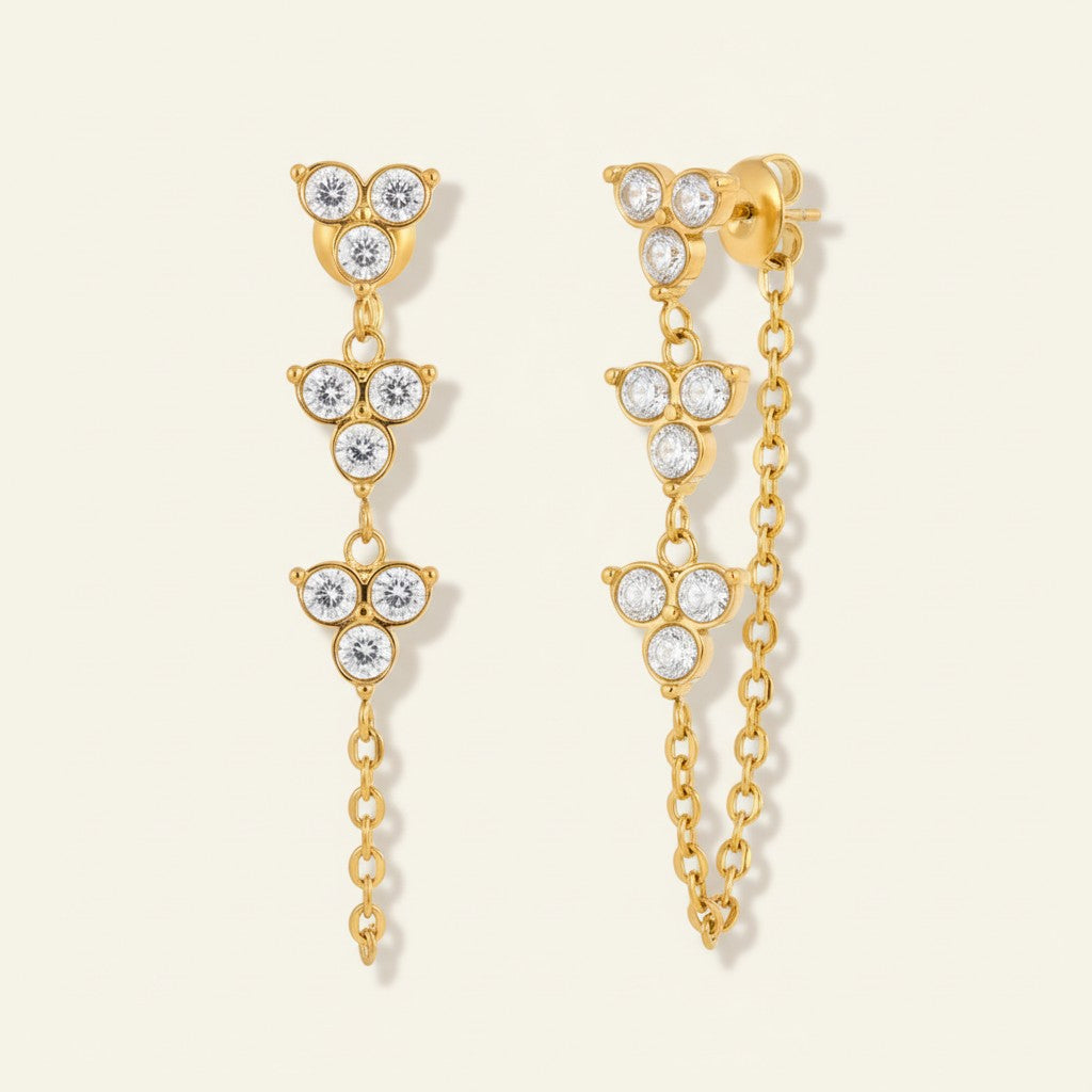 Seraphina Treasures Phyrixa gold drop earrings with cascading zircon stones and chain detailing.