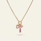 Seraphina Treasures gold necklace with pink heart charm and pink cubic zirconia.