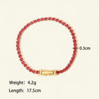Seraphina Treasures Albina bracelet with red crystal zircon accents and gold-tone clasp, 17.5cm length.