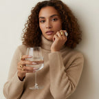 Seraphina Treasures Regara adjustable ring set with two gold and one silver oval-shaped, glossy finish rings.