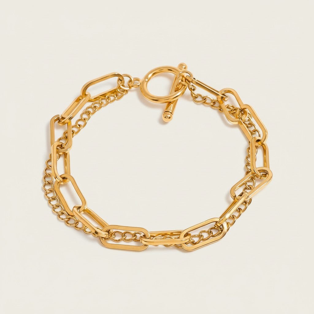 Seraphina Treasures Rhea gold layered chain bracelet with toggle clasp and oval links.