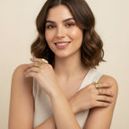 Seraphina Treasures Rosalune ring with gold band and oval resin containing dried flowers. Square ring with green stone.