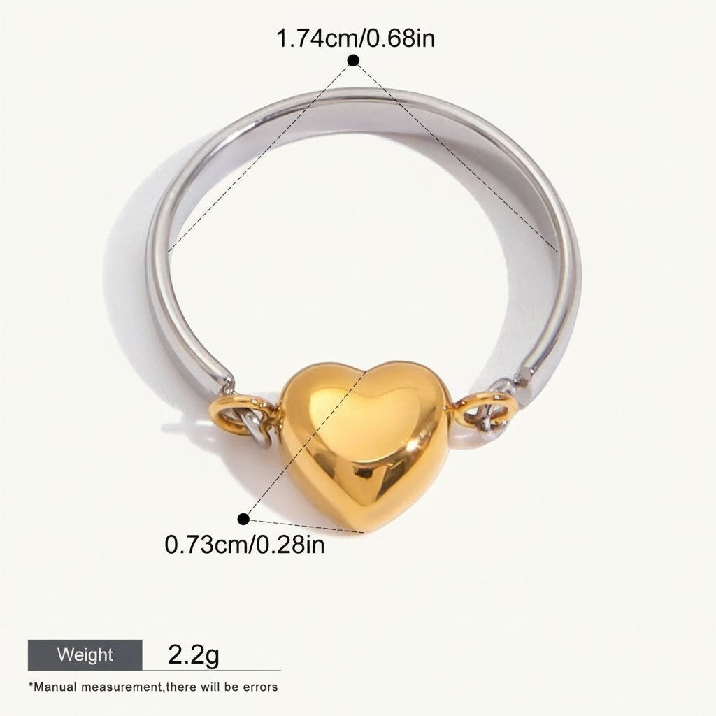 Seraphina Treasures Sapphira ring with a gold heart charm and silver band. Waterproof and hypoallergenic.