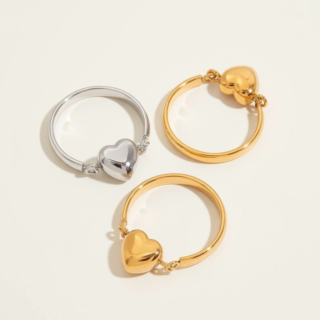 Seraphina Treasures Sapphira ring with a heart design in silver and gold tones, perfect for expressing love.