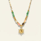 Seraphina Treasures Sarai necklace with a gold sun pendant and a colorful natural stone bead chain.