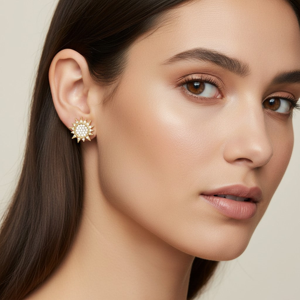 Seraphina Treasures Selara gold sun and moon stud earrings with clear zirconia stones.