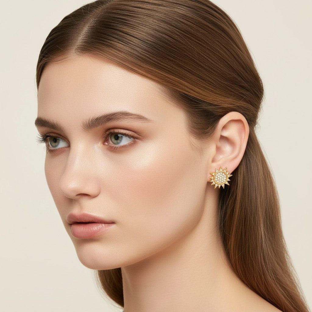 Seraphina Treasures Selara gold sun and moon earrings with sparkling zirconia stones. Celestial design.