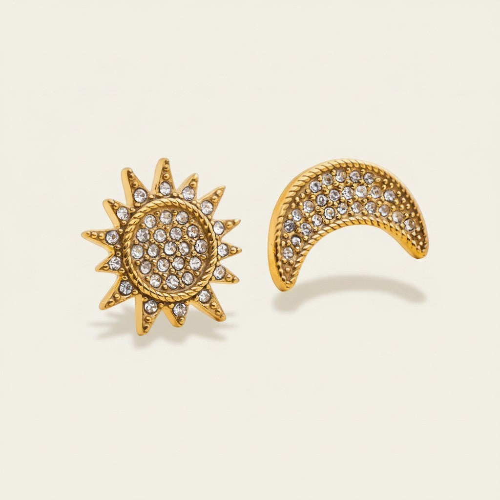 Seraphina Treasures Selara gold-tone earrings with sun and moon design, encrusted with sparkling zirconia stones.
