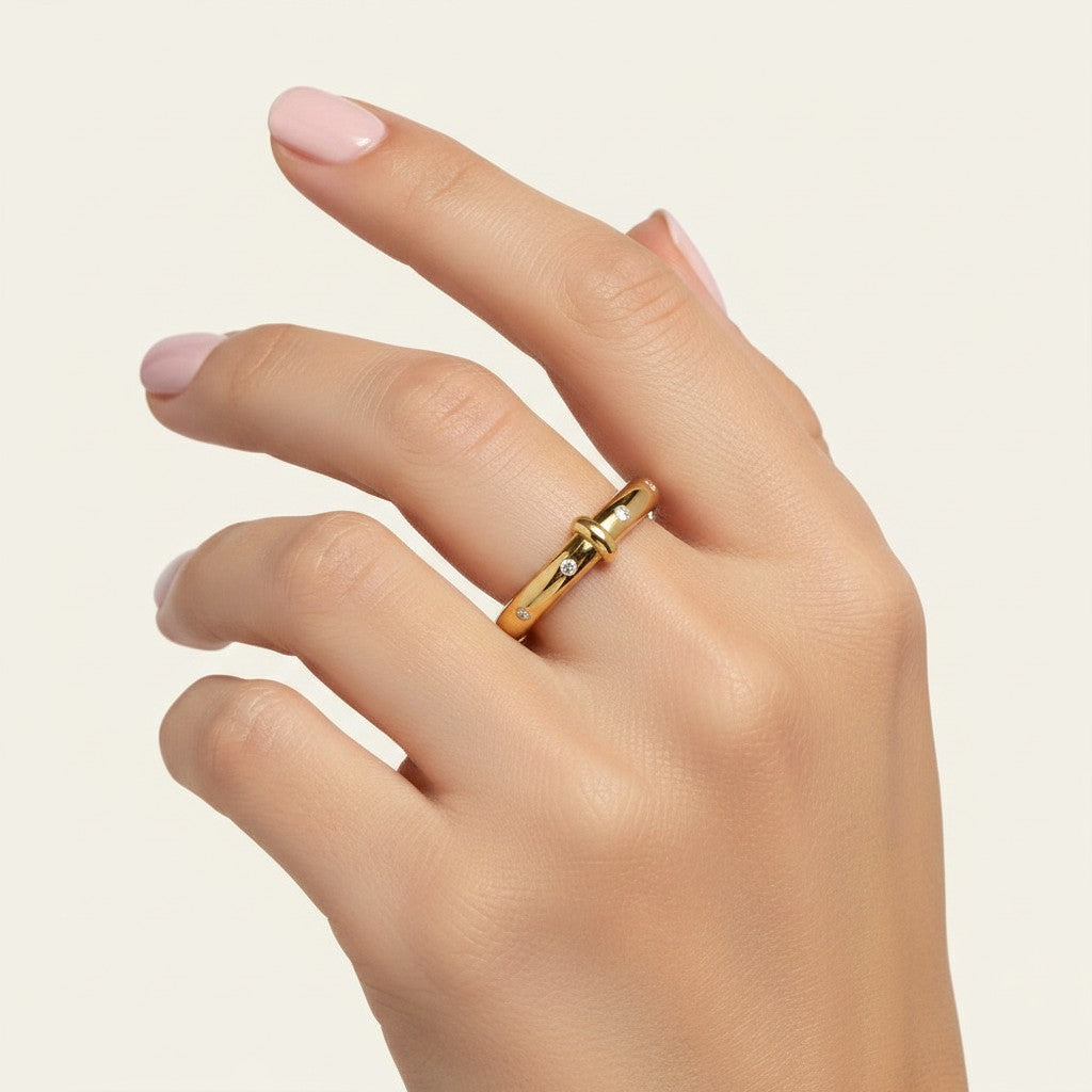 Seraphina Treasures Selene gold ring with clear zircon stones, featuring a unique bar accent.