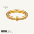 Seraphina Treasures Selene gold ring with clear zircon stones and a unique central bar detail. Waterproof and hypoallergenic.