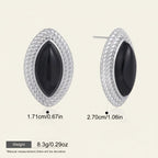 Seraphina Treasures Selenya oval black onyx stud earrings with silver rope-like border. Equestrian charm.