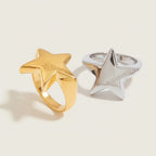 Seraphina Treasures Selora ring in gold and silver, featuring a star shape with BLESSING engraved.