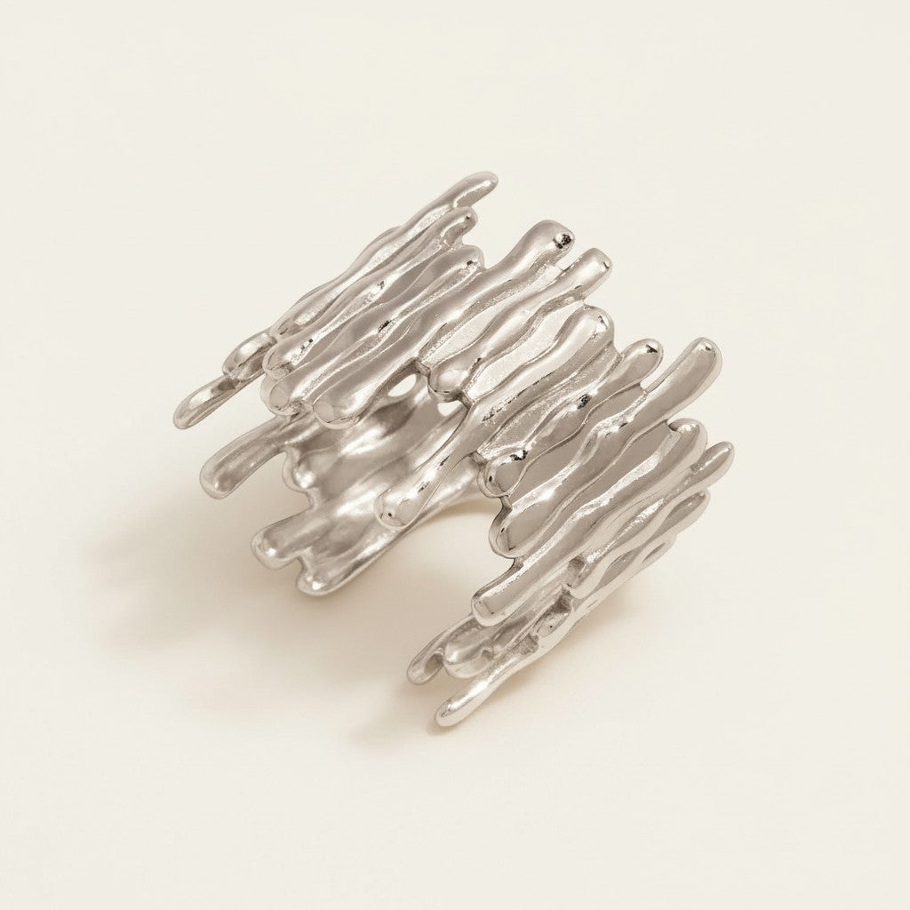 Seraphina Treasures Selvarra silver irregular geometric open band ring with angular details.