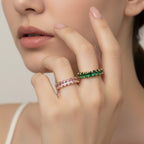 Seraphina Treasures Seraphiel adjustable ring with clear, pink, and green cubic zirconia stones on a gold-tone band.