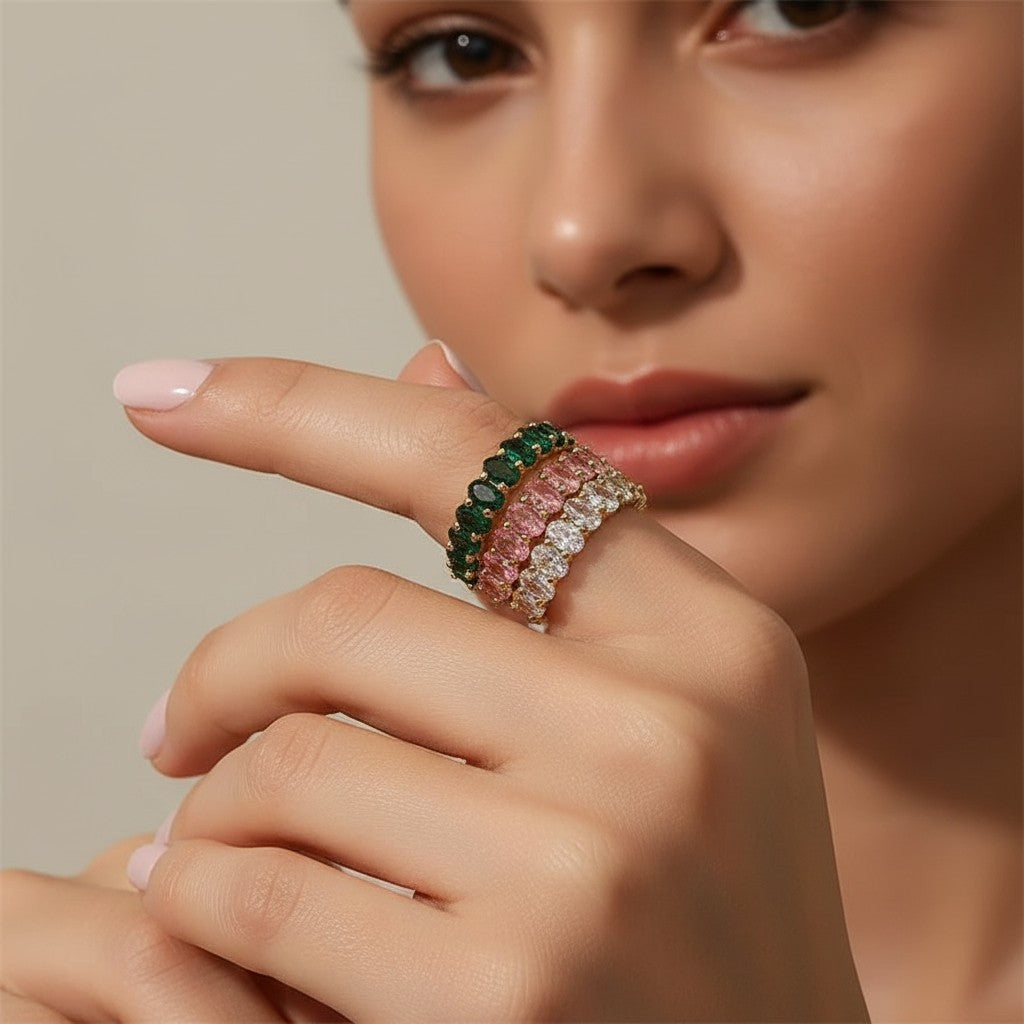 Seraphina Treasures Seraphiel ring with green, pink, and clear cubic zirconia stones on a copper band.
