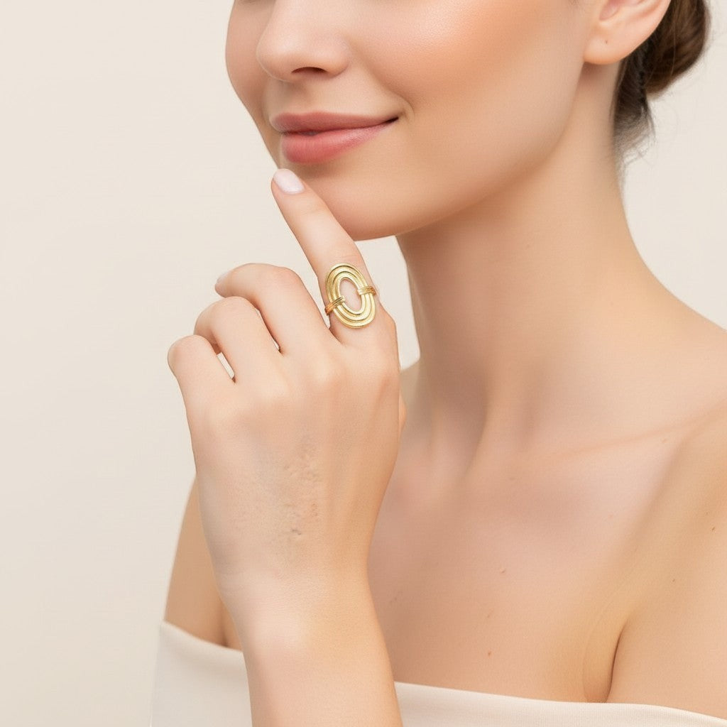 Seraphina Treasures Serastal gold ring with geometric threading and open adjustable band.
