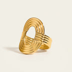Seraphina Treasures Serastal gold-tone adjustable ring with geometric threading detail.