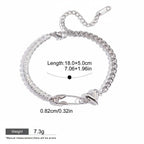 Seraphina Treasures silver bracelet with cubic zirconia, safety pin, and heart charm. Adjustable length.