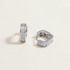 Seraphina Treasures Kymeris silver geometric earrings with baguette-cut crystals.