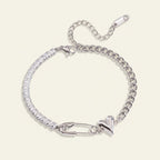 Seraphina Treasures silver bracelet with cubic zirconia, safety pin, and heart charm. Adjustable chain.