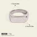 Seraphina Treasures Thalora silver-tone stainless steel signet ring with a smooth, geometric design. Waterproof and hypoallergenic.
