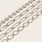 Seraphina Treasures silver-tone bracelets: star chain, oval link chain, and rhinestone-accented chain.