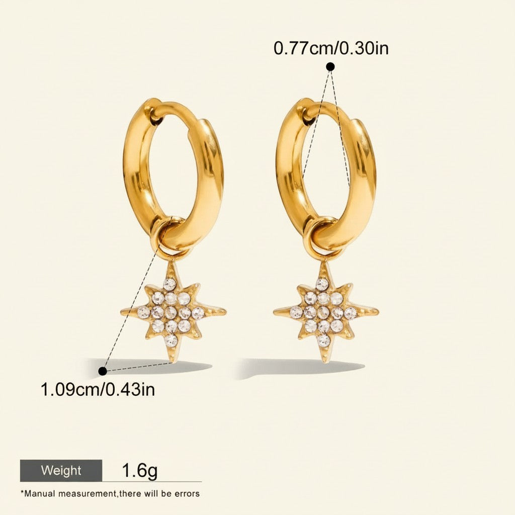 Seraphina Treasures Solara gold hoop earrings with starburst charms encrusted with cubic zirconia. Waterproof & hypoallergenic.