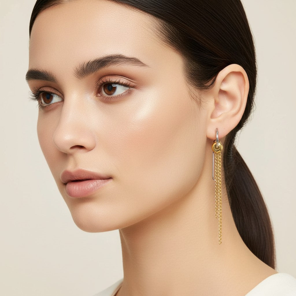 Seraphina Treasures Solarin gold heart and chain drop earrings with tassel detail. Hypoallergenic.
