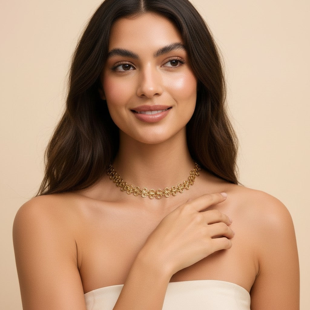Seraphina Treasures Sorcha gold choker necklace with intricate hollow round links, worn by a model.