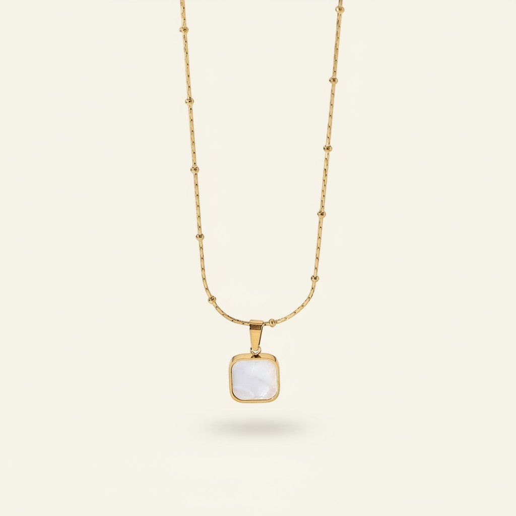 Seraphina Treasures Squerra necklace with gold chain and square mother-of-pearl pendant.