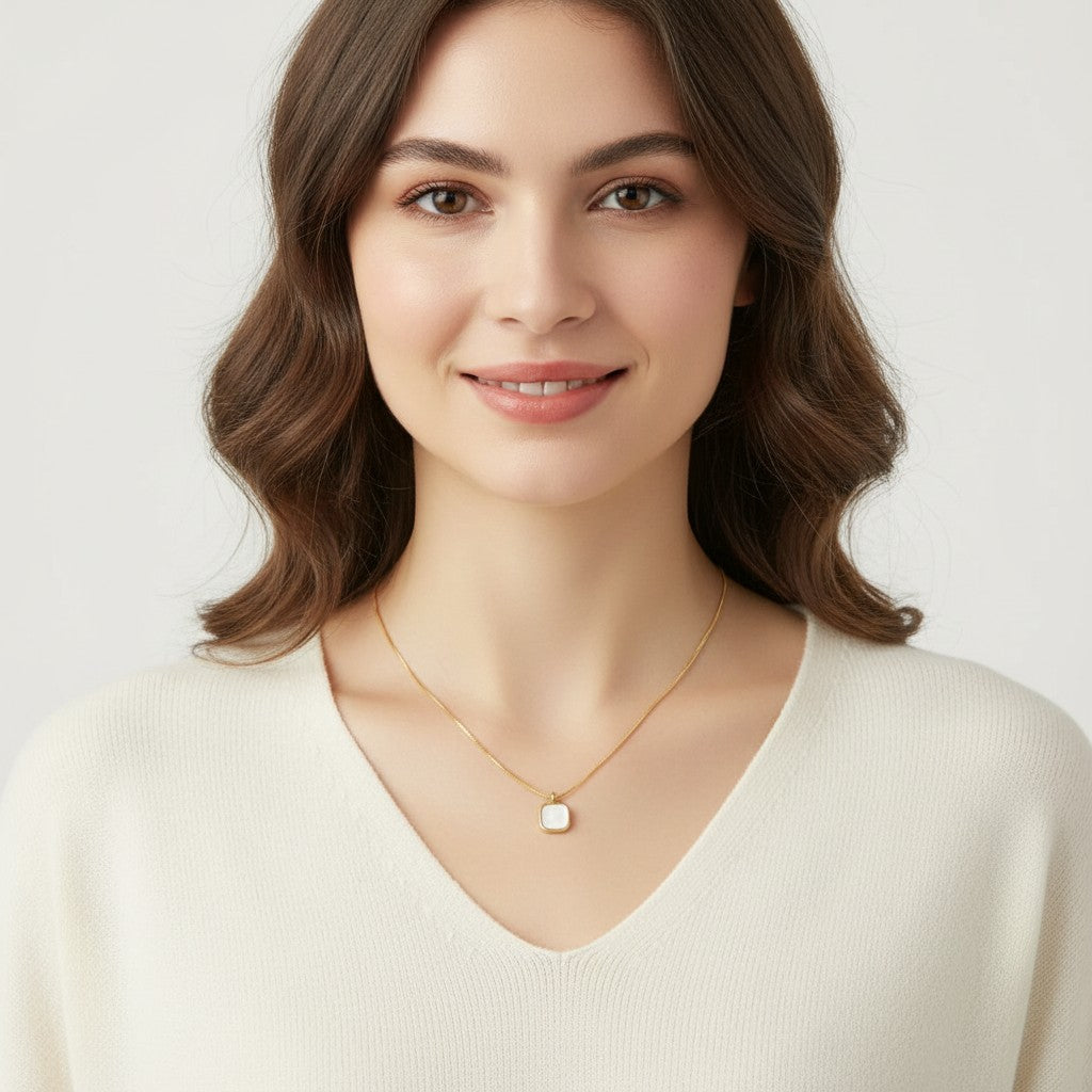 Seraphina Treasures Squerra necklace with a square mother-of-pearl pendant on a delicate gold chain.