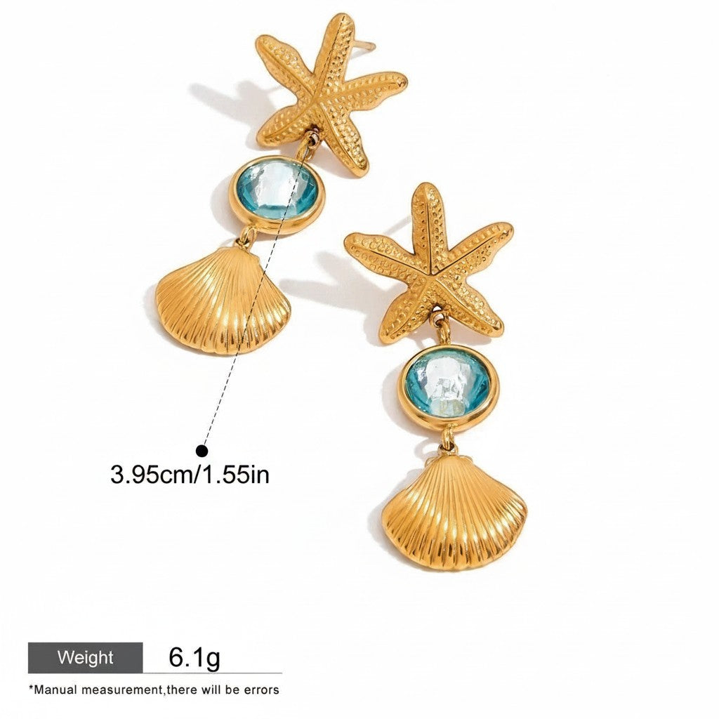 Seraphina Treasures gold starfish and shell dangle earrings with blue gemstones. Lightweight and hypoallergenic.