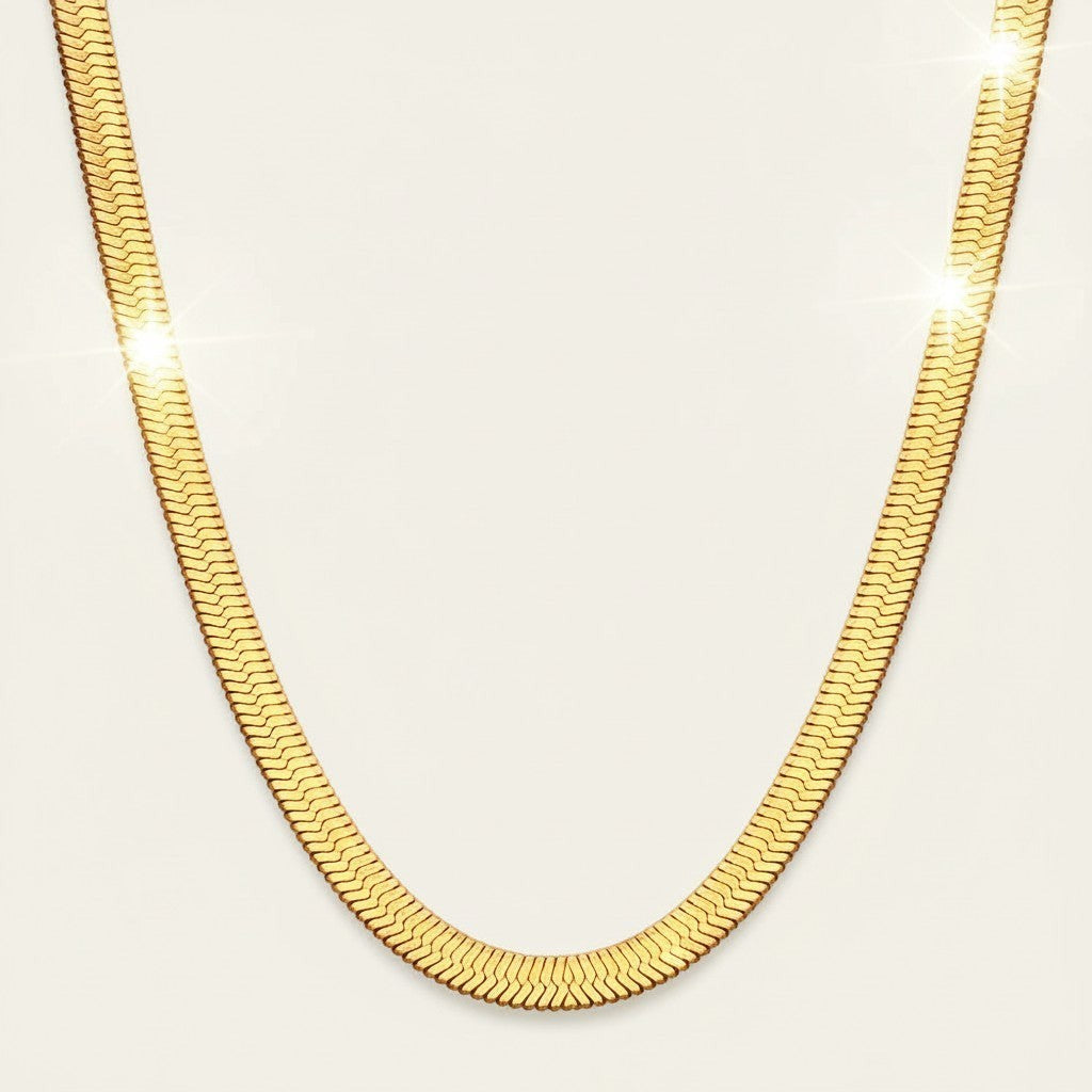 Seraphina Treasures Sterline gold herringbone necklace, smooth and elegant for everyday wear.