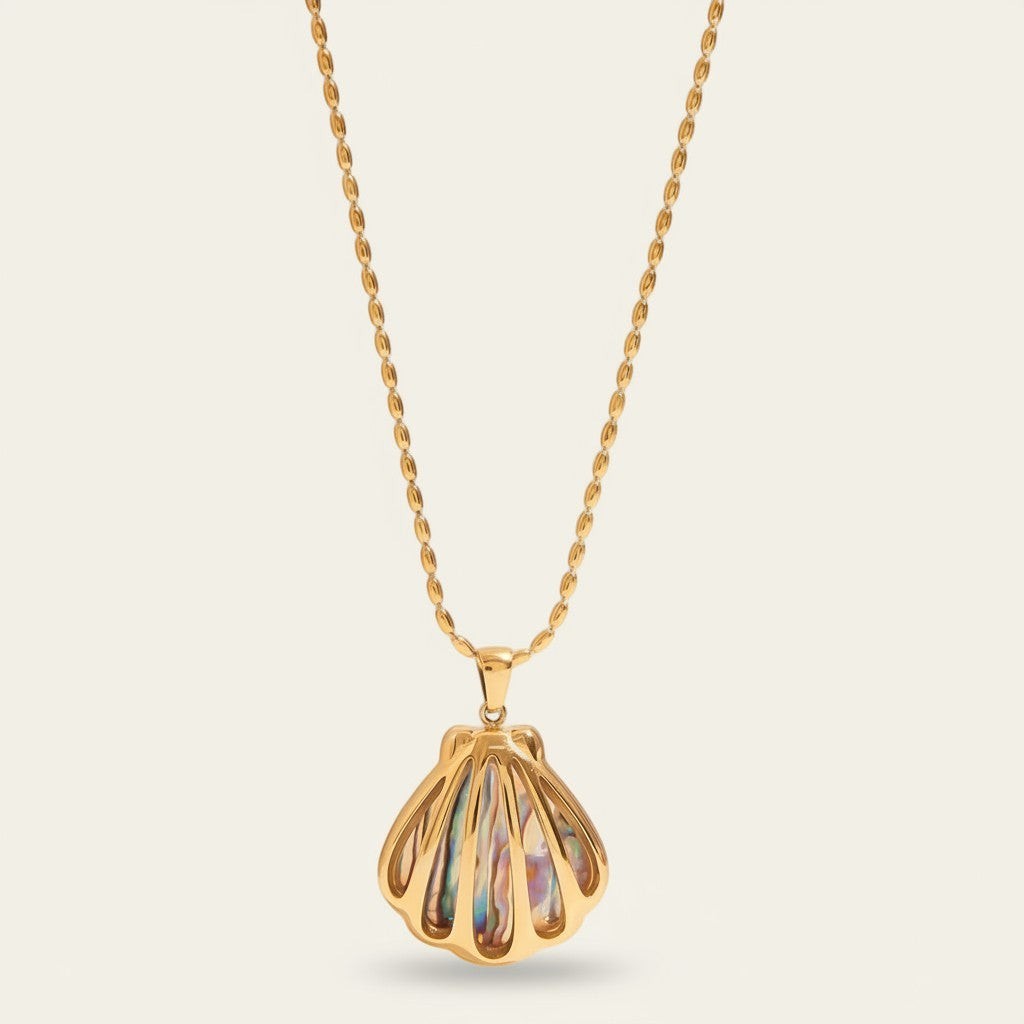 Seraphina Treasures Tegan necklace with gold chain and iridescent shell pendant. Lightweight and colorful.