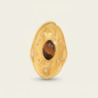 Seraphina Treasures Thalmyra adjustable gold ring with oval tiger eye stone and small clear crystals, star details.