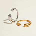 Seraphina Treasures Themis open cuff bracelet in silver and gold tones. Minimalist, modern design.