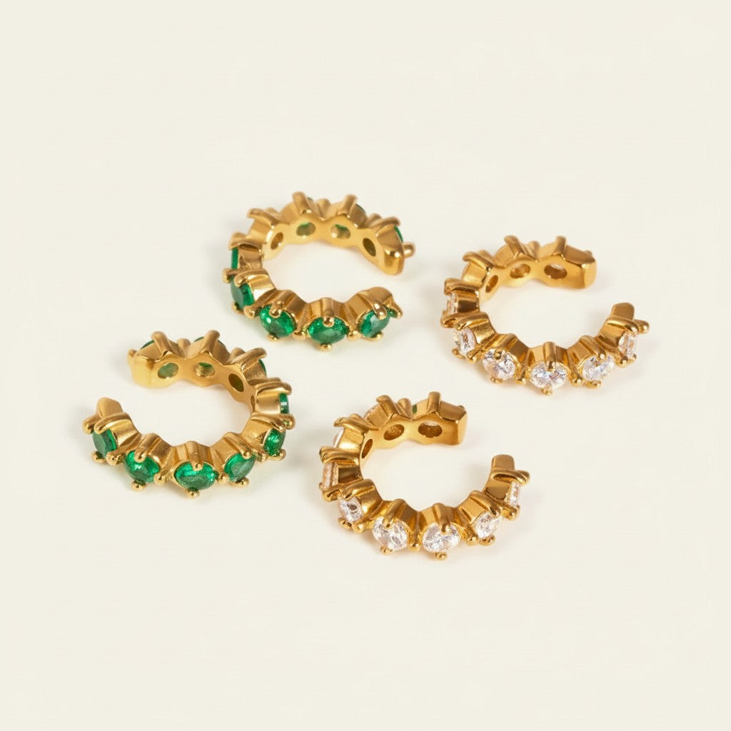 Seraphina Treasures Theonara ear clips with green or white zircon stones. Gold-tone metal, non-piercing design.