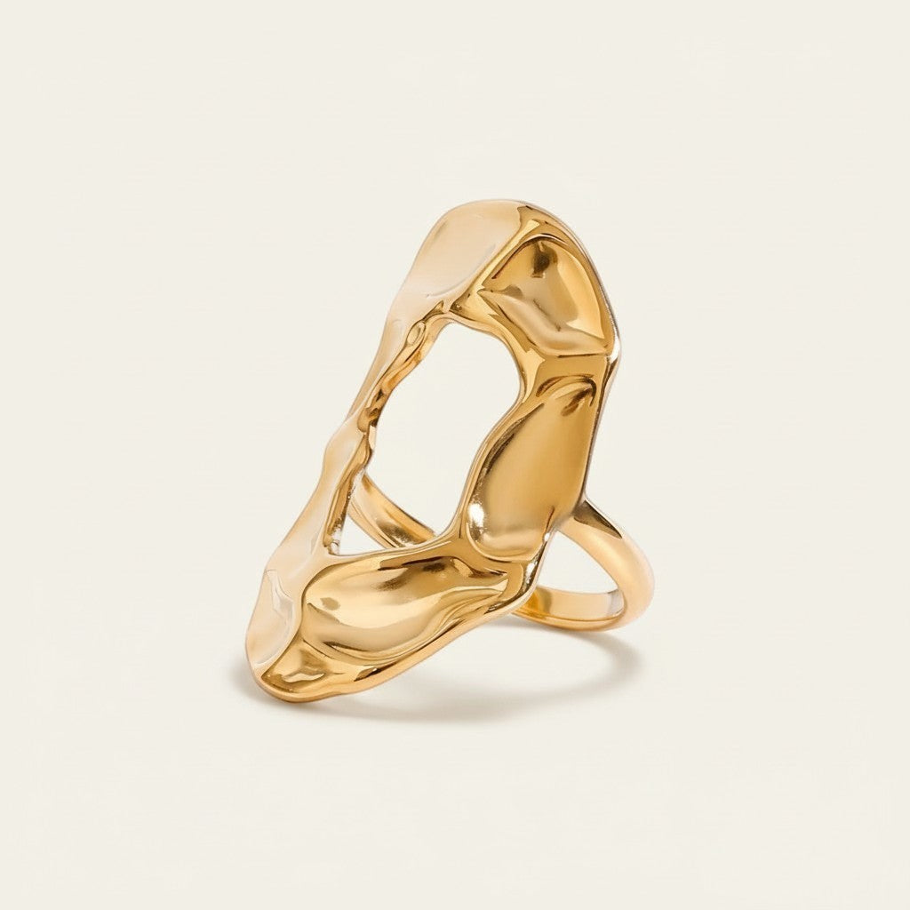 Seraphina Treasures Thyra gold hammered open ring with abstract design. Adjustable and lightweight.