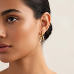 Seraphina Treasures Tiaris two-tone gold and silver interlocking oval drop earrings with minimalist geometric design.