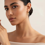 Seraphina Treasures Tiaris geometric drop earrings with interlocking gold and silver oval shapes.