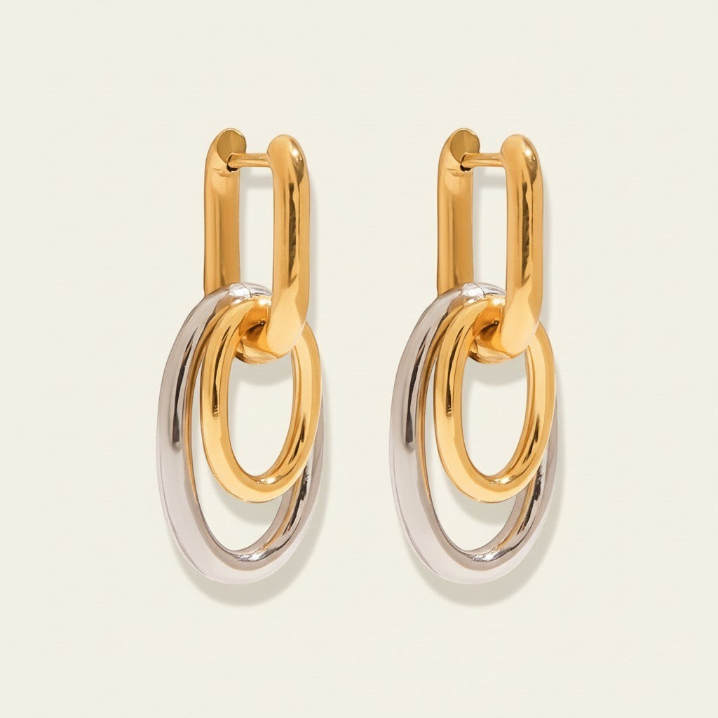 Seraphina Treasures Tiaris two-tone gold and silver interlocking oval link earrings.