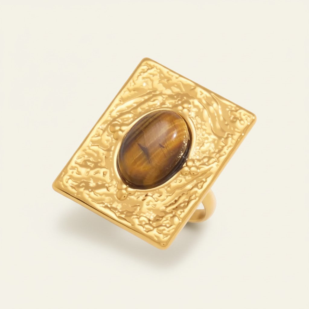 Seraphina Treasures Petralyne open ring with a square tiger eye stone and textured gold-tone band.