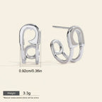 Seraphina Treasures Valencia silver-tone safety pin hoop earrings, modern design, lightweight, hypoallergenic.