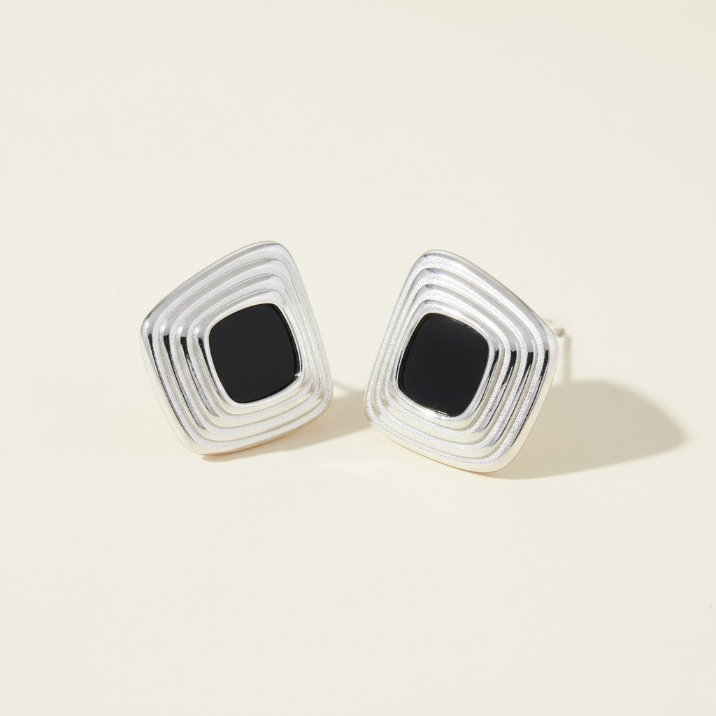 Seraphina Treasures Valykris silver resin earrings with black inlay, featuring a layered square design.