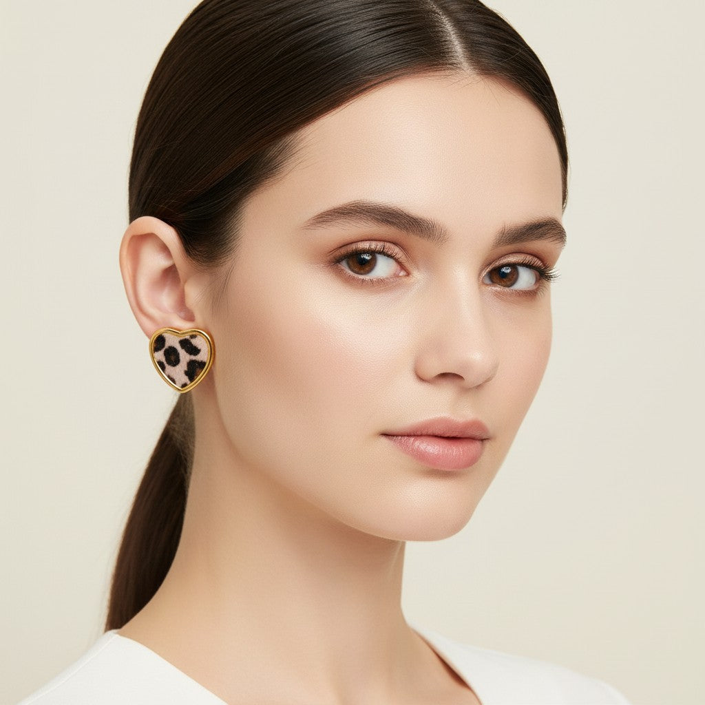 Seraphina Treasures Veloria heart-shaped earrings with leopard print faux fur and gold trim.