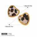 Seraphina Treasures Veloria heart-shaped earrings with leopard print faux fur and gold trim. Waterproof and hypoallergenic.