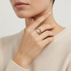 Seraphina Treasures Vespera ring with intertwined silver and gold stars, open cuff design.