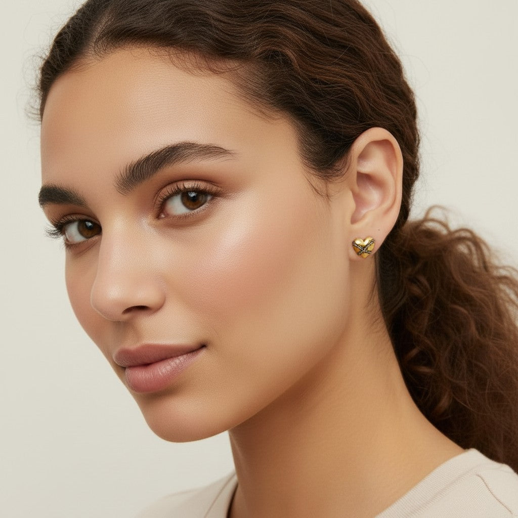 Seraphina Treasures Vespria gold heart earrings with intricate detailing, perfect for everyday elegance.