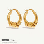 Seraphina Treasures Veyora gold hoop earrings with intertwined loops, hypoallergenic and waterproof.