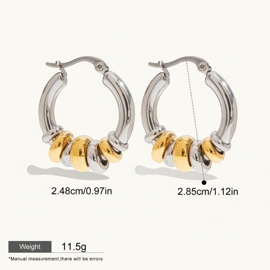 Seraphina Treasures Veyora two-tone hoop earrings with gold and silver intertwined loops. Hypoallergenic.